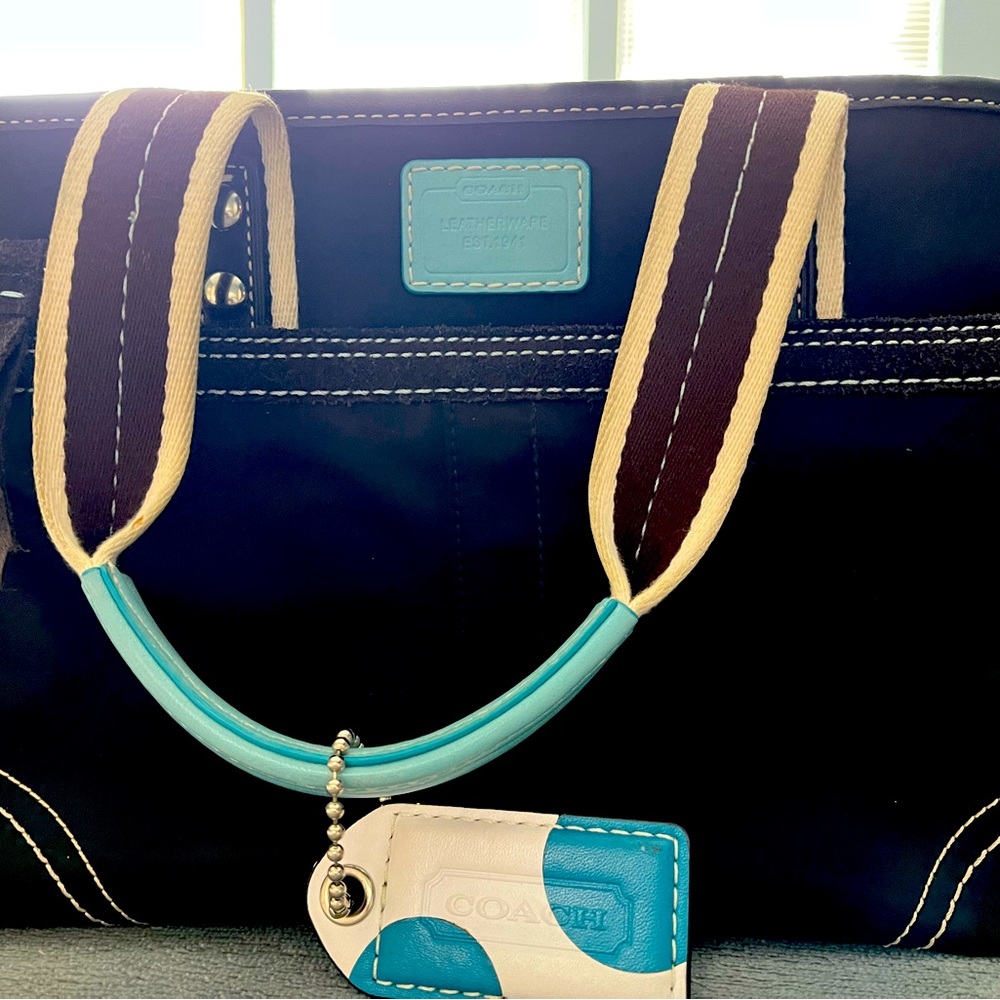 Coach handbag black with with and aqua trim